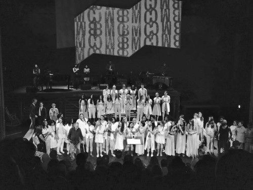 Basil accepts applause from chorus and audience.